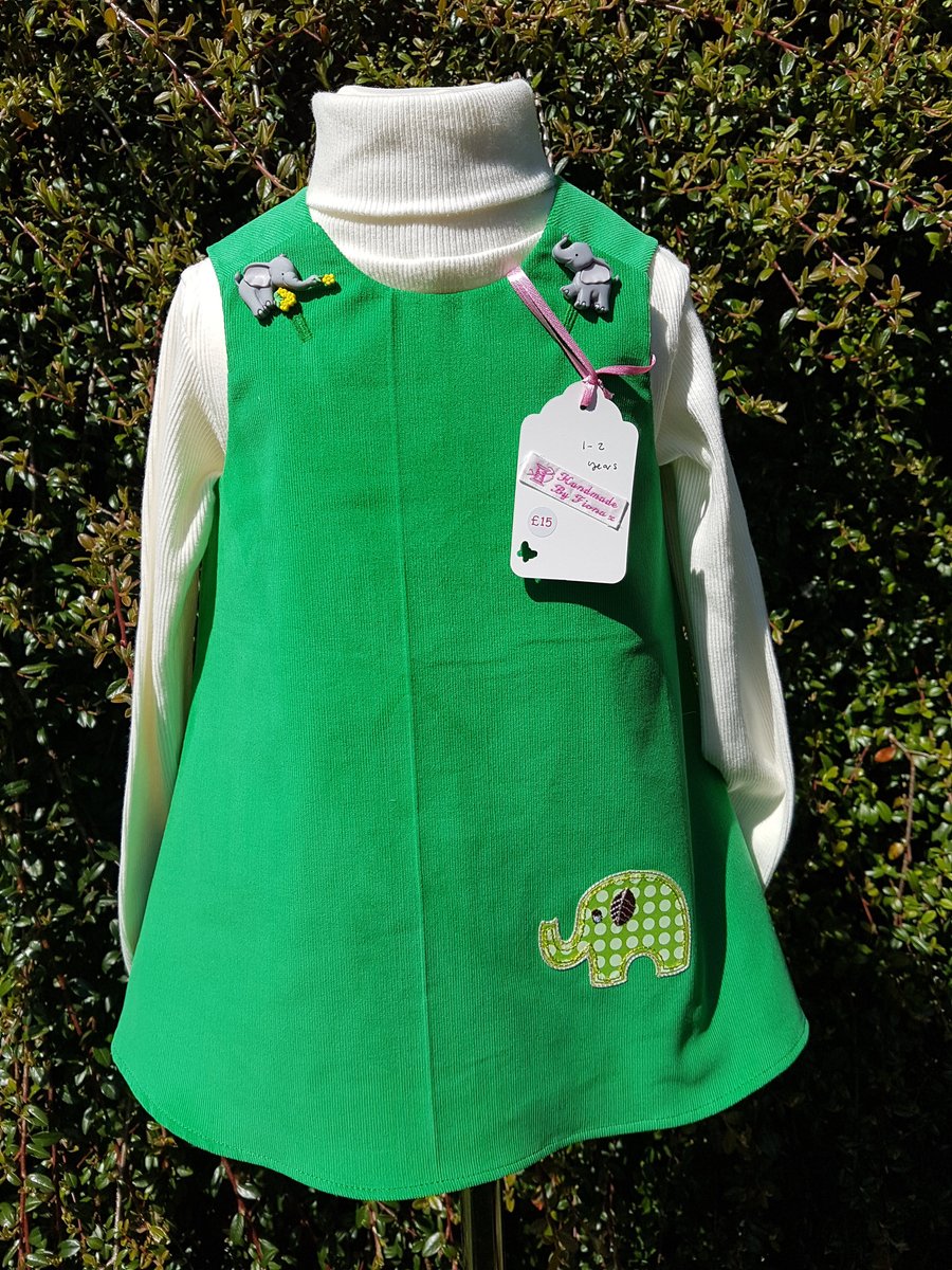 Age: 1-2y. Emerald green baby needlecord pinafore dress. 