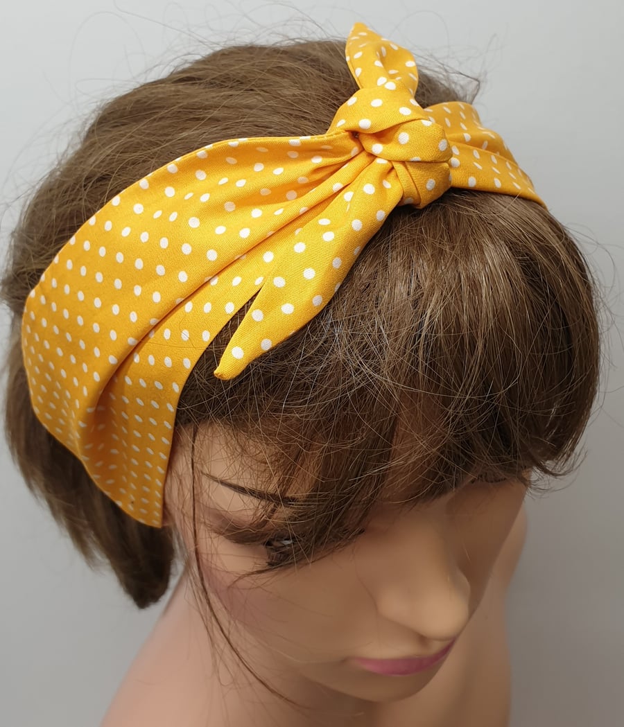 Women self tie yellow polka dot cotton headband.