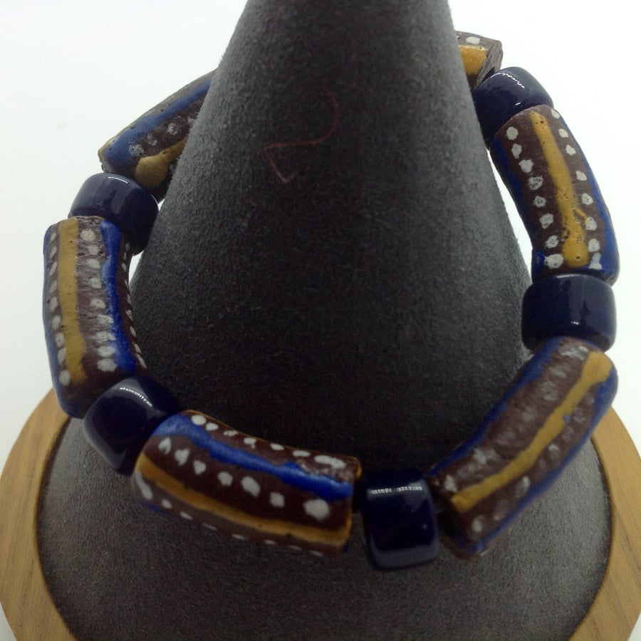 Brown, blue and yellow African bead bracelet  with dark blue Indian beads