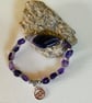 Aquarius February elasticated charm bracelet featuring amethyst beads