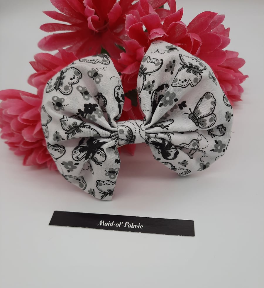 Hair bow slide clip in white and black butterflies. 3 for 2 offer. 