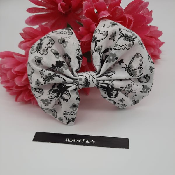 Hair bow slide clip in white and black butterflies. 3 for 2 offer. 