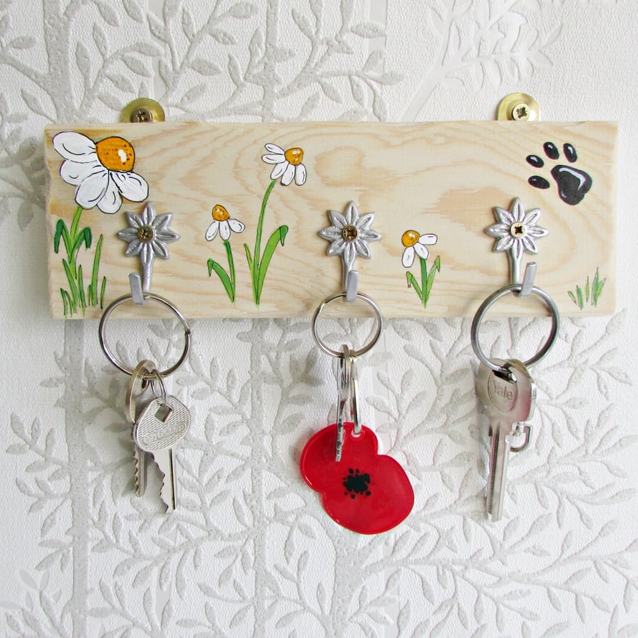 Dog Lead Hook and Key Holder, painted with daisy flowers and a paw print.