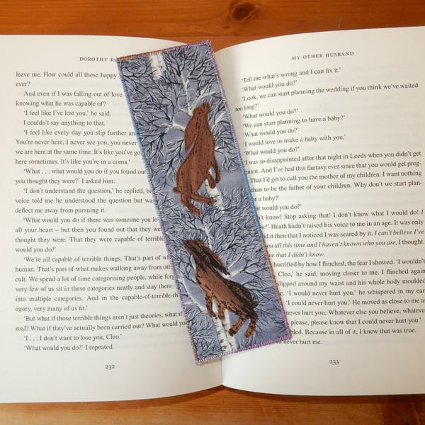 Bookmark leaping hares