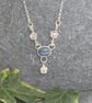 Sterling silver flower necklace with kyanite, dainty gemstone necklace - Image 1