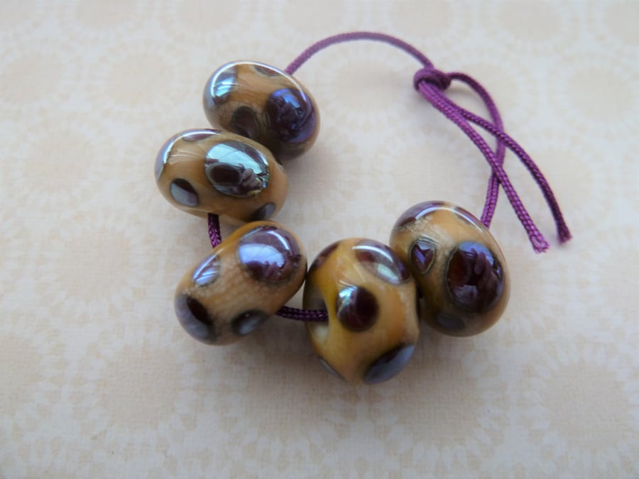 handmade lampwork glass beads, ivory and silver spots