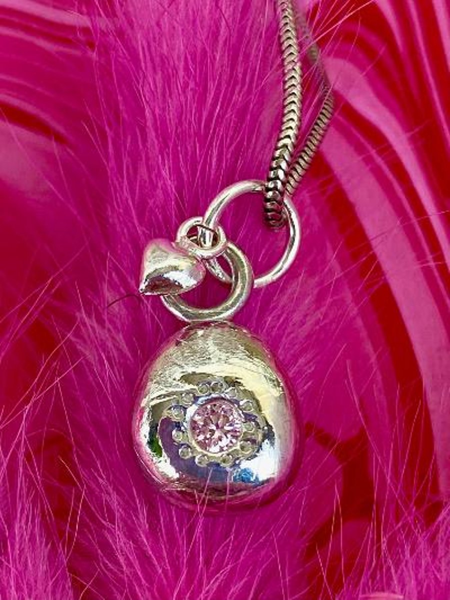 Solid silver Boob pendant necklace with pink gemstone