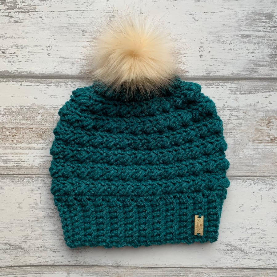 Handmade teal crochet beanie hat with faux fur pompom