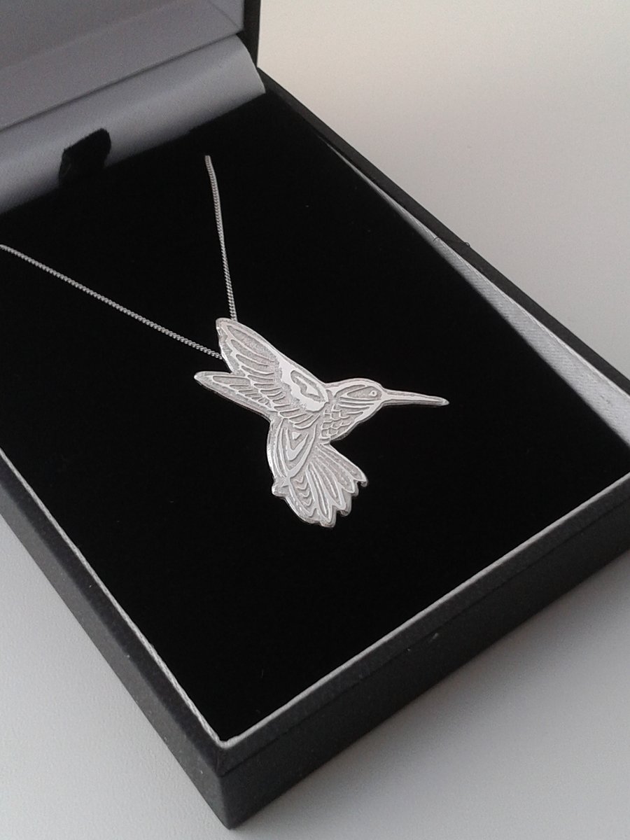 Hummingbird silver pendant