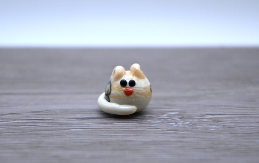 small glass cat figure