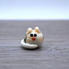 small glass cat figure