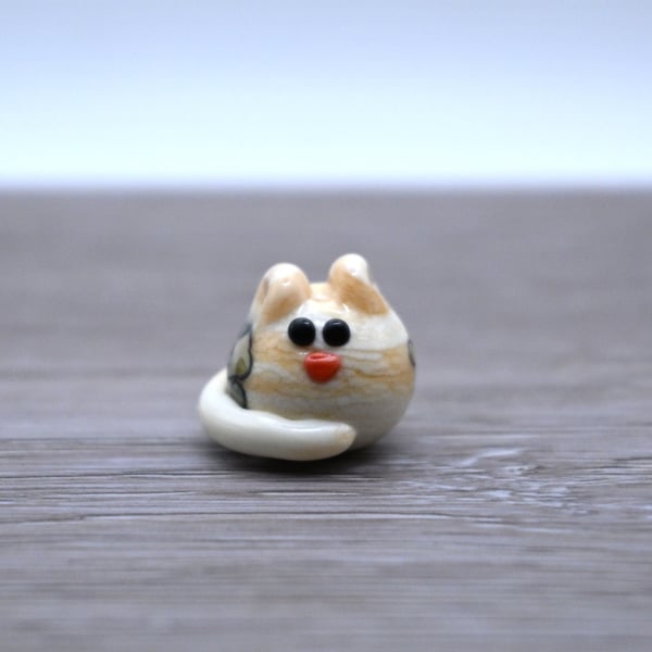 small glass cat figure