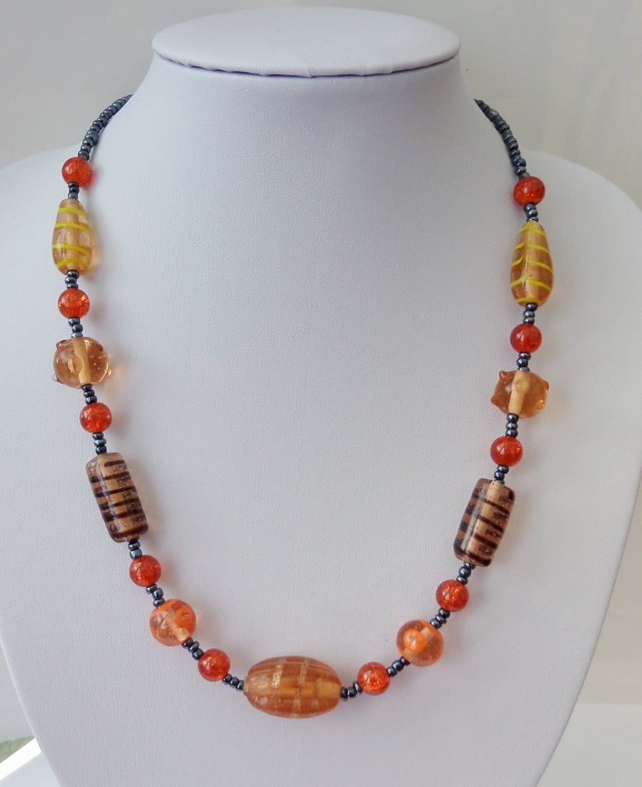 Orange crackle and lampwork cream beige tones glass bead necklace. Gift or treat
