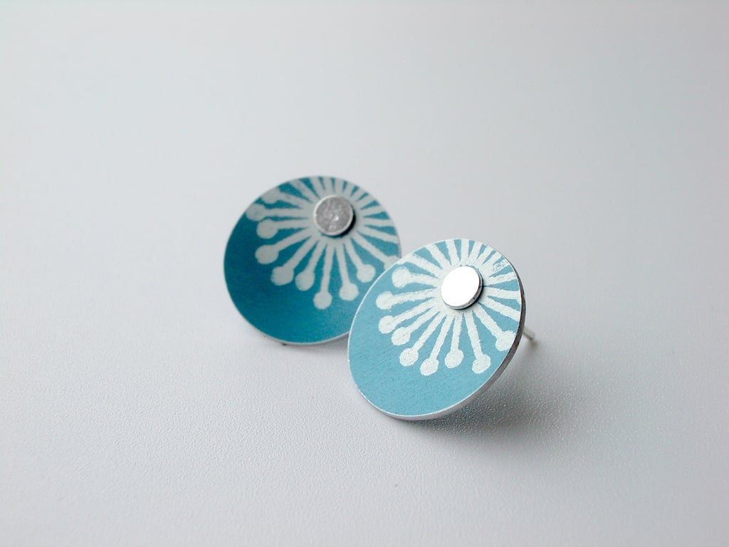 Teal blue starburst studs earrings
