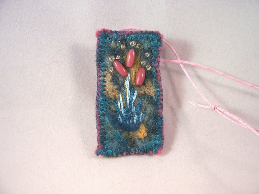 Felted and hand embroidered necklace with beads