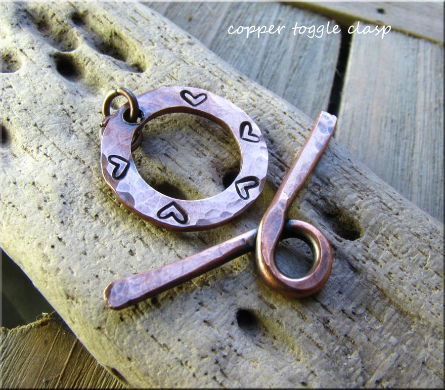 Copper washer toggle clasp