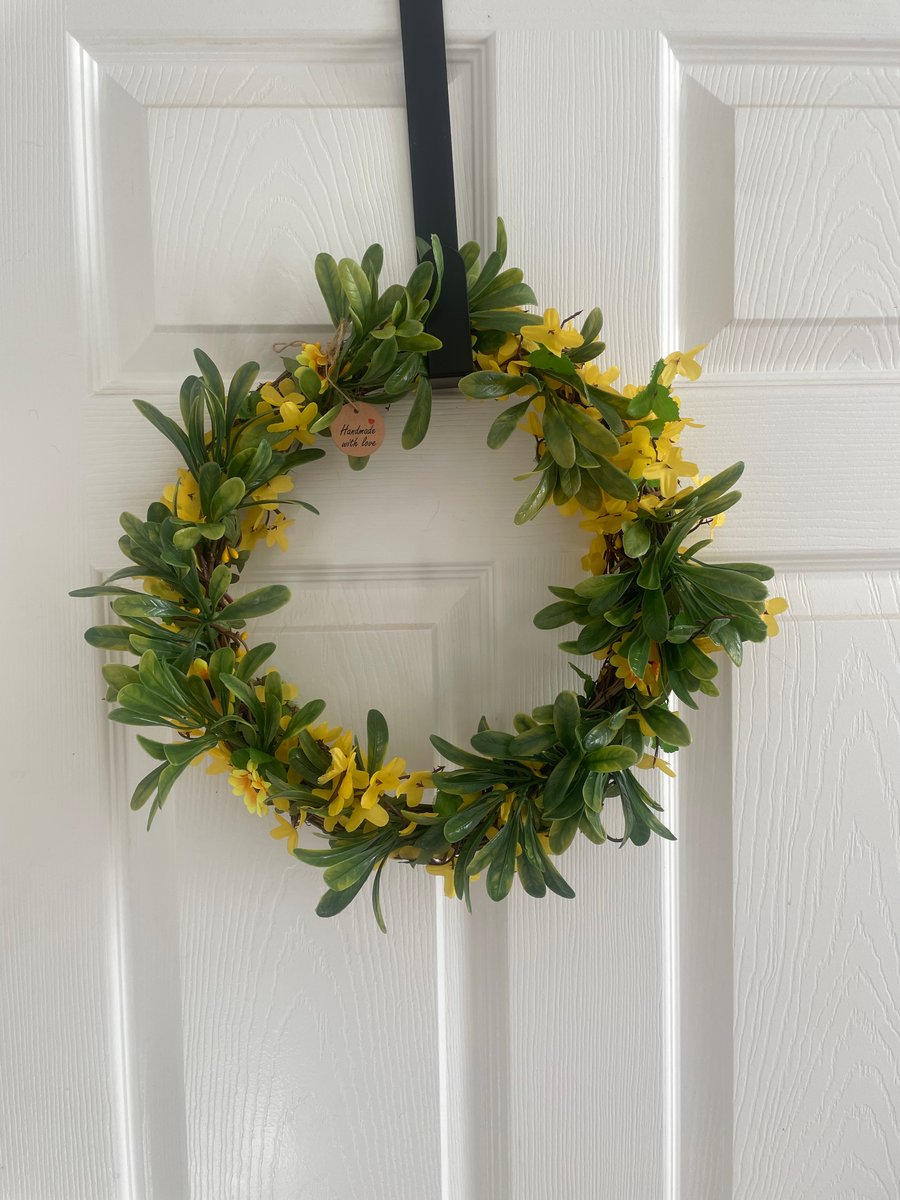 Handmade seasonal wreaths and hearts 