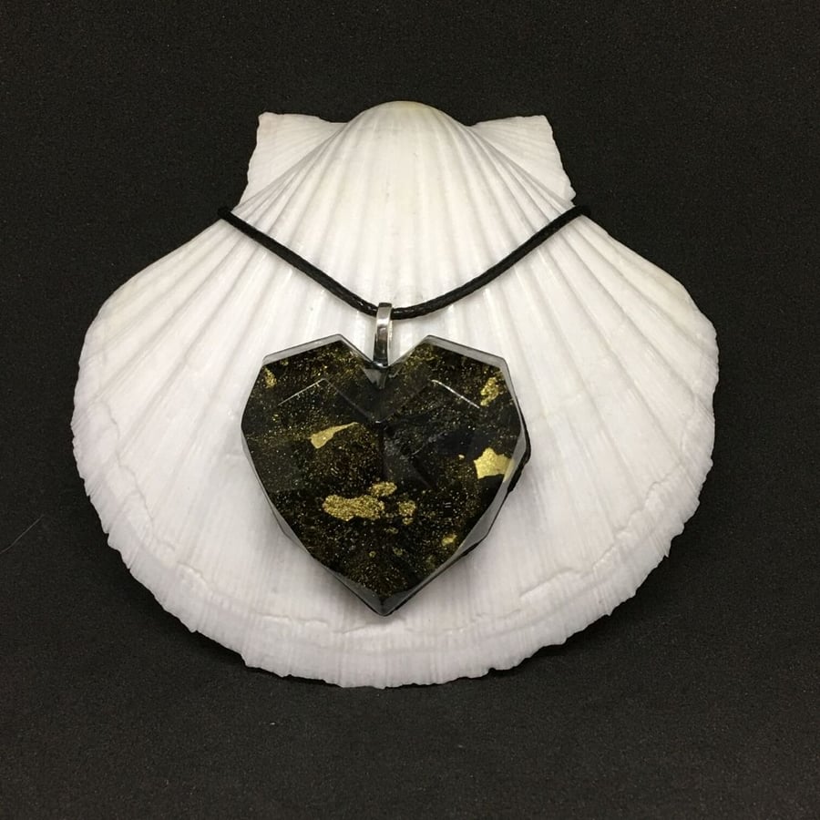 Black and gold heart statement pendant resin and ink with silver plated chain.