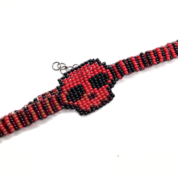 Red and black beaded skull striped choker necklace