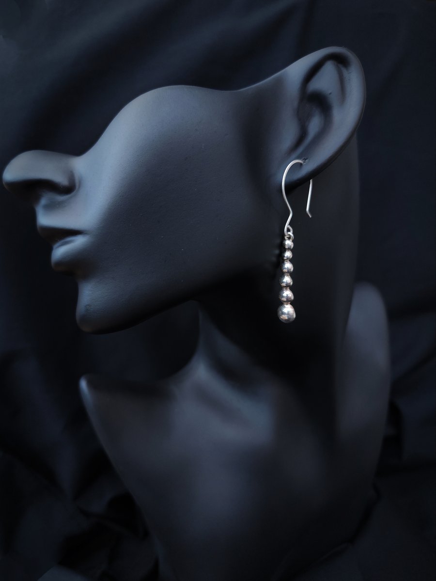 Silver pebbles drop earrings