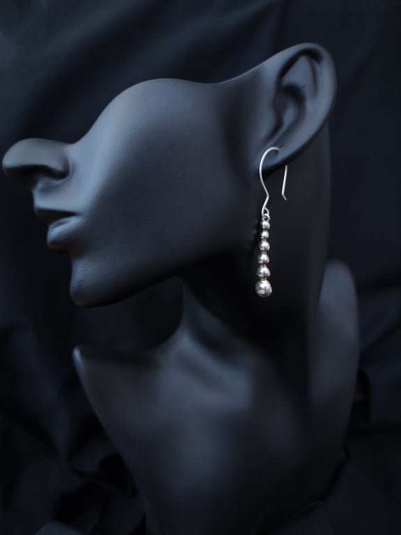 Silver pebbles drop earrings