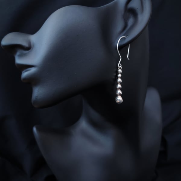 Silver pebbles drop earrings