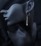 Silver pebbles drop earrings - Image 1