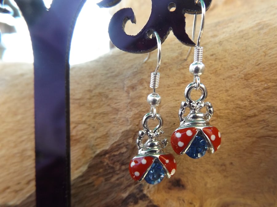 Lady bird earrings with blue crystal