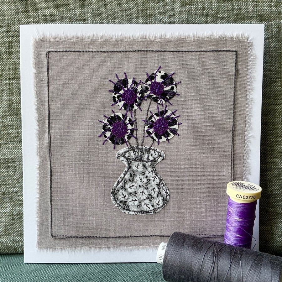 Embroidered appliqué greetings card with envelope.
