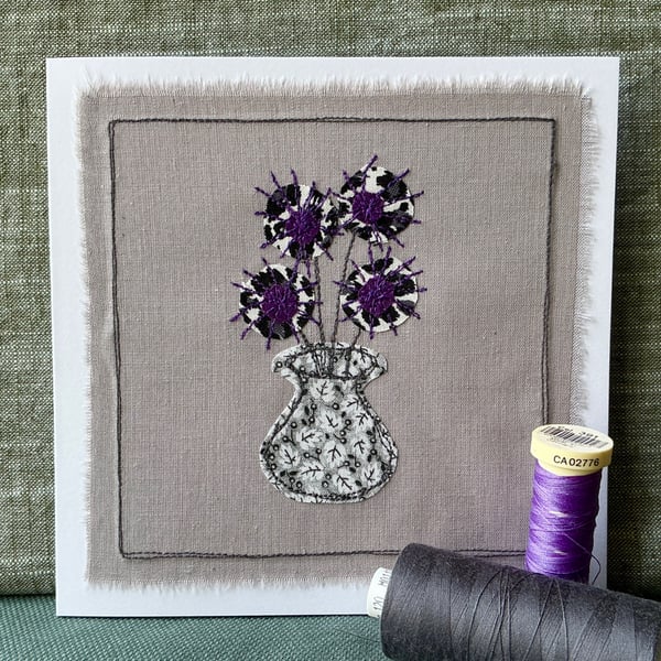 Embroidered appliqué greetings card with envelope.