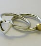 Silver & 9ct gold 2 interlocking Heart Rings - Image 2