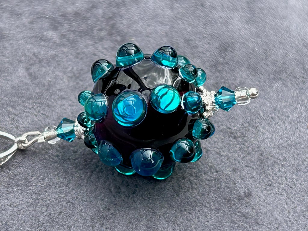 turquoise mirrored spotty and purple lampwork glass pendant