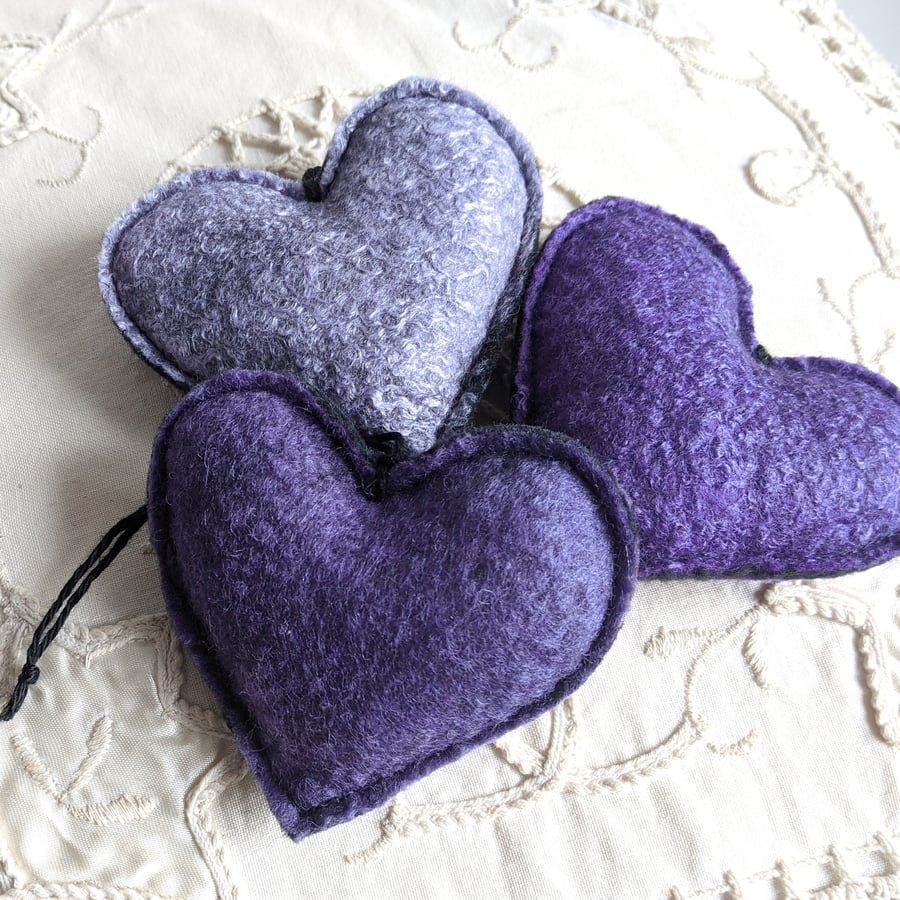 Three lavender hearts in shades of purple