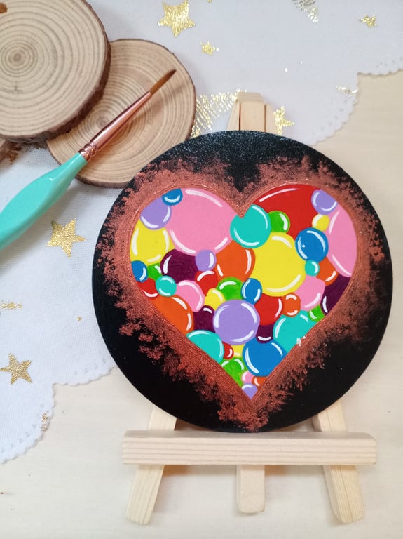 Wooden circular painted heart with easel