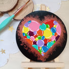 Wooden circular painted heart with easel