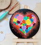 Wooden circular painted heart with easel - Image 1
