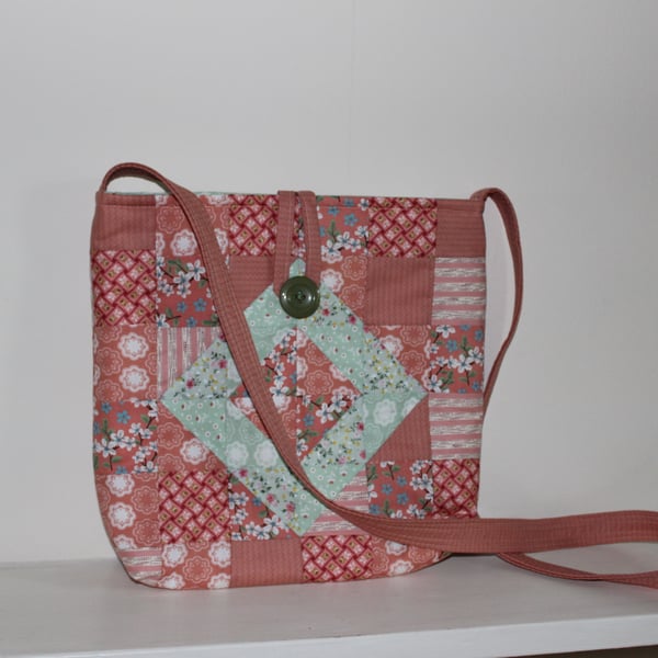 Coral pink cross body bag