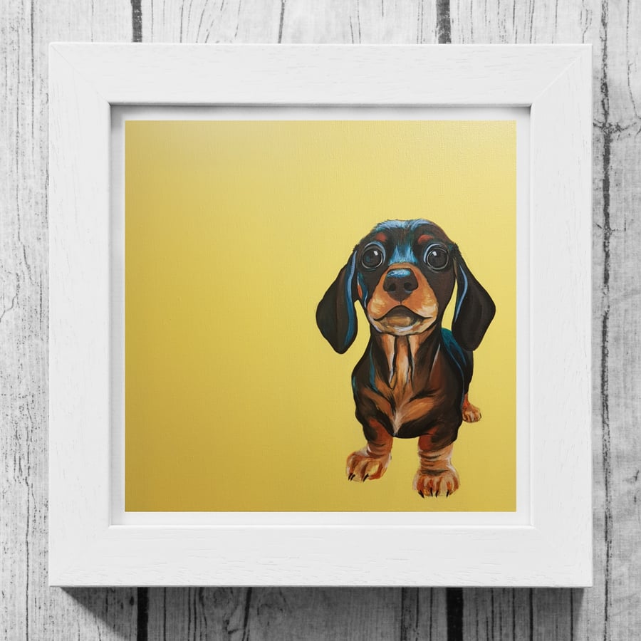 Cute black and tan Dachshund puppy framed print