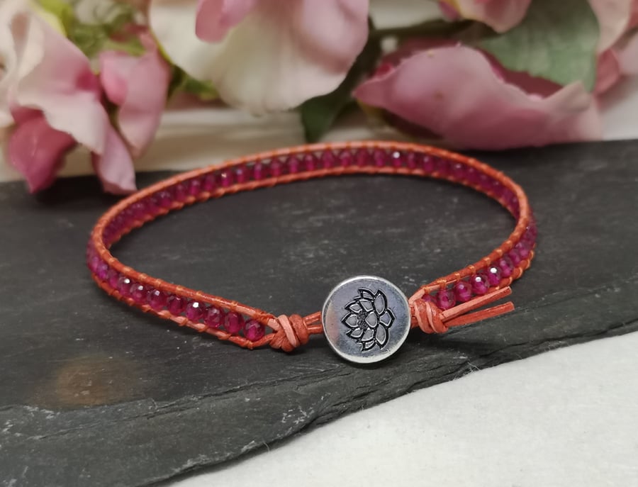 Pink spinel gemstone and orange leather bracelet, August birthstone 