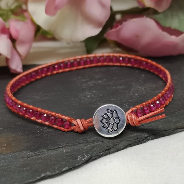 Pink spinel gemstone and orange leather bracelet, August birthstone 