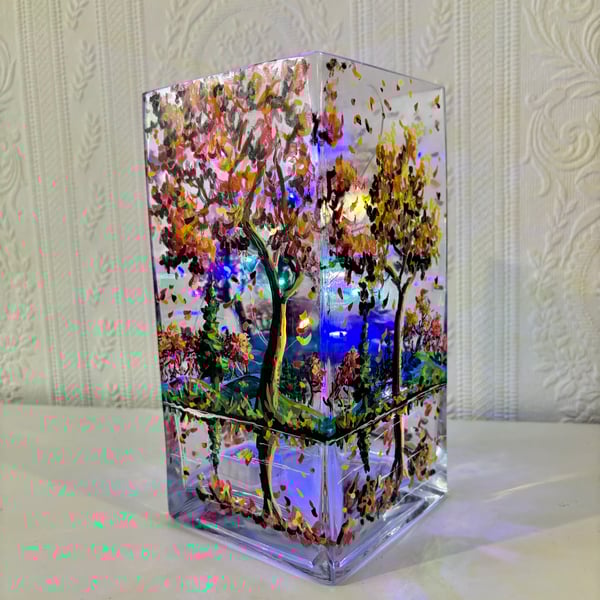 A hand painted and fired glass vase by Andrew Jenkins 