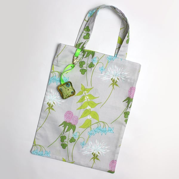Dead nettle print tote bag with hand embroidered bag charm