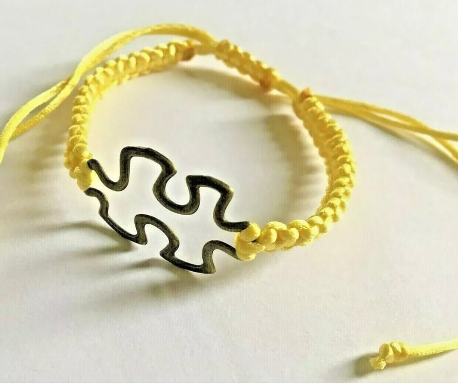 Antique Bronze colour Autism Awareness Jigsaw Charm on Yellow Macrame Bracelet 