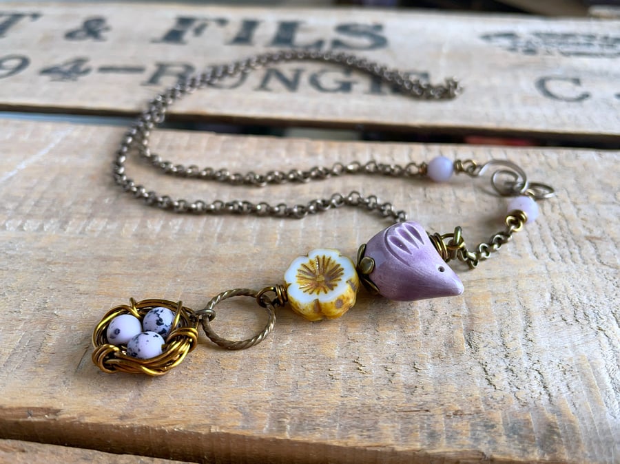 Whimsical Purple Bird & Nest Pendant with Brass Chain. Artisan Ceramic Necklace
