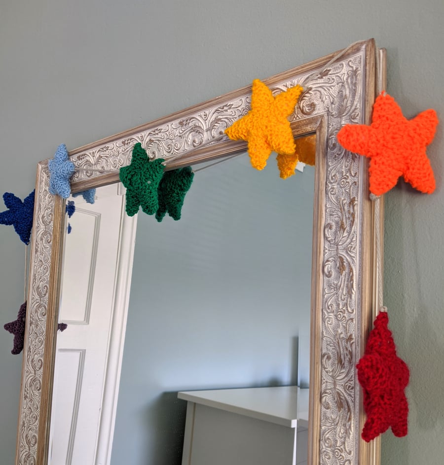 Hand-knitted rainbow stars