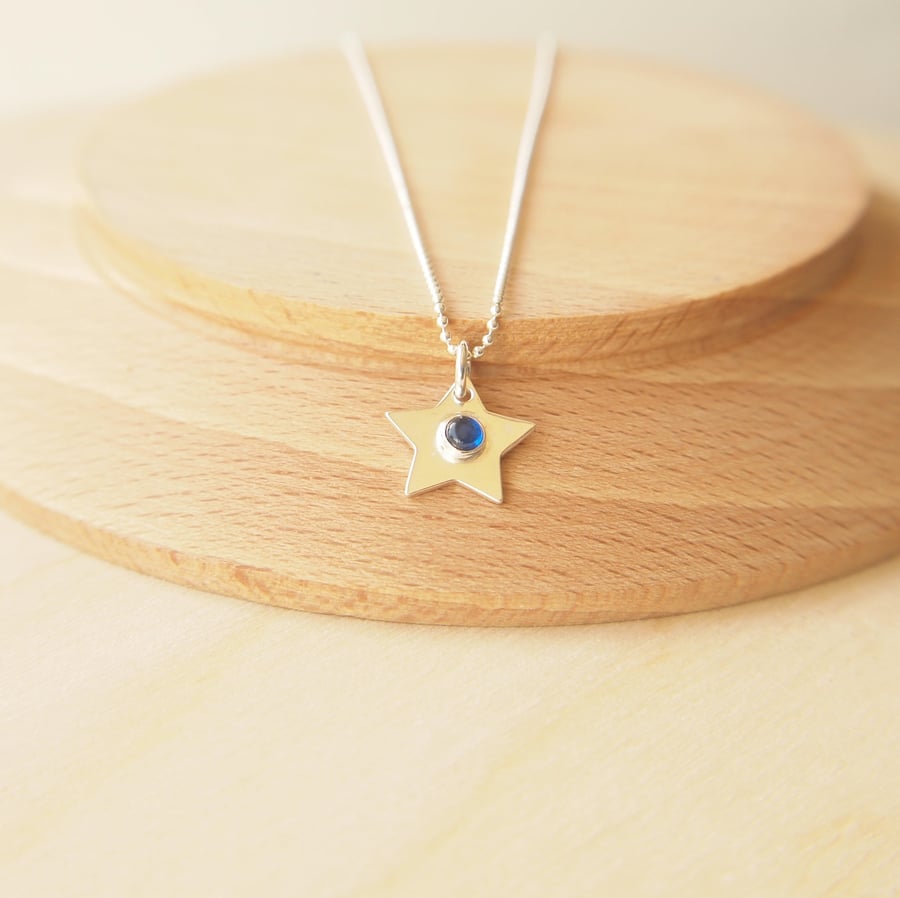 Silver Star Pendant with September Birthstone Lab Sapphire