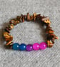 Bisexual Pride – Elastic Bracelet with Glass Beads and Tiger’s Eye Chip - Image 1