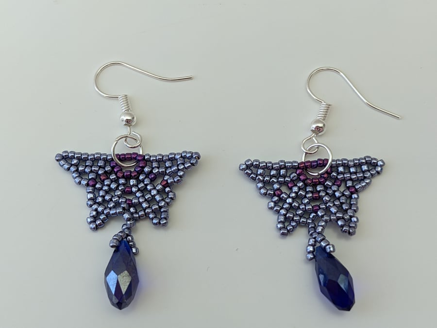 Purple and lilac beaded butterfly earrings with crystal drop