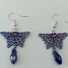 Purple and lilac beaded butterfly earrings with crystal drop