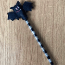 241. Bat pencil topper.